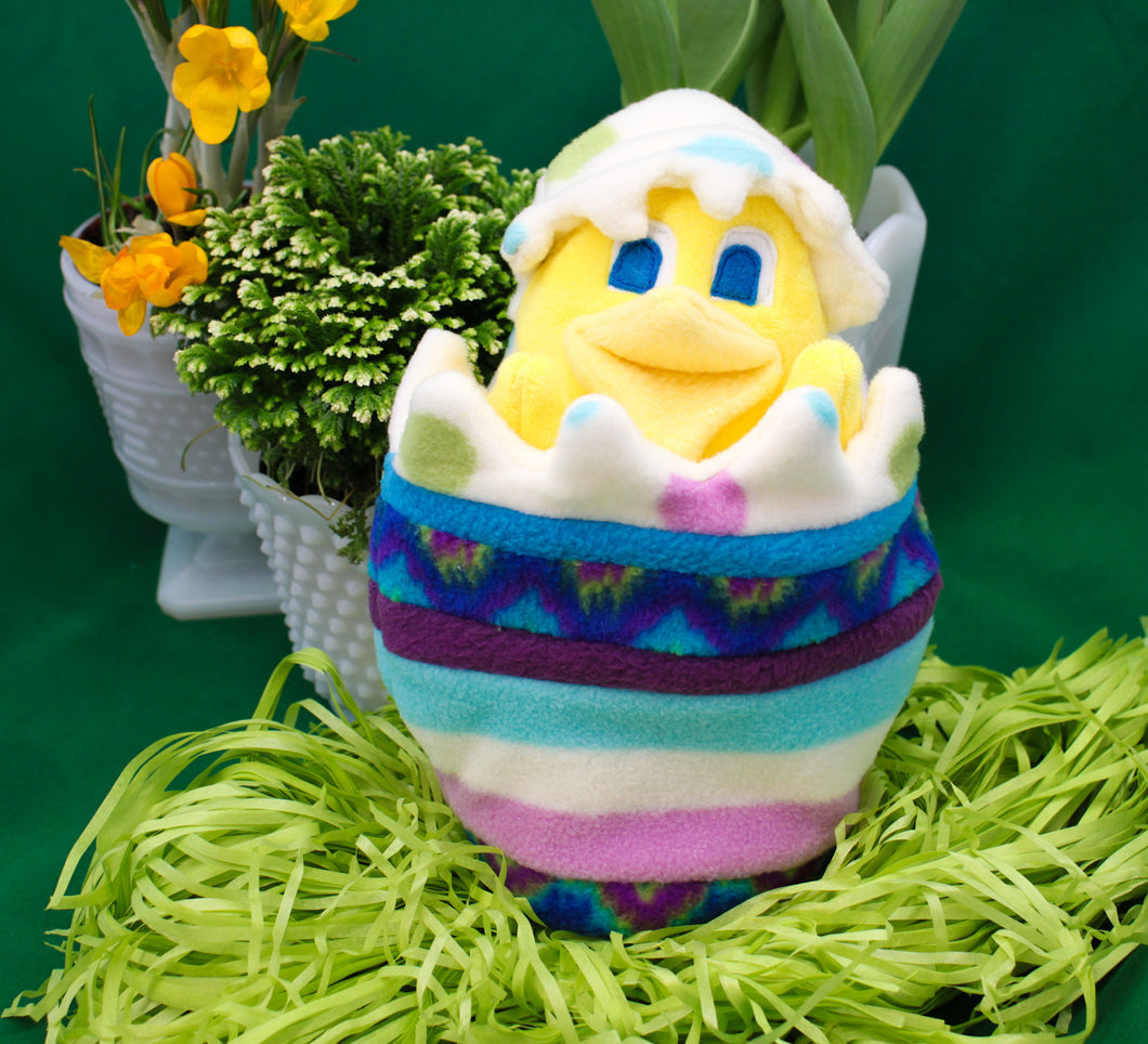 This Peek a boo Puppet is a yellow chick in an Easter egg. It is made of fleece with sewn on eyes. It is washable and safe for all ages.